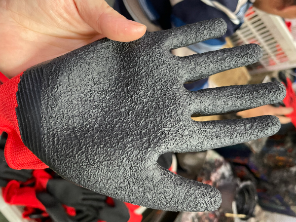 Container loaded for latex coated working gloves, safety working hand gloves